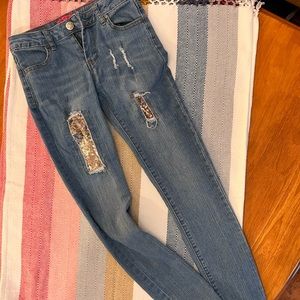 Betsey Johnson size 10 distressed jeans boot cut